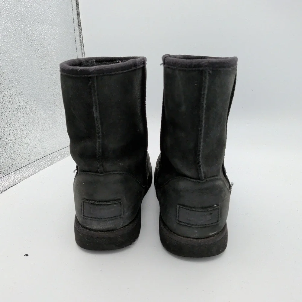 UGG Classic Short II Black Leather Sheepskin Boot Waterproof Girls 3 101964K Kid